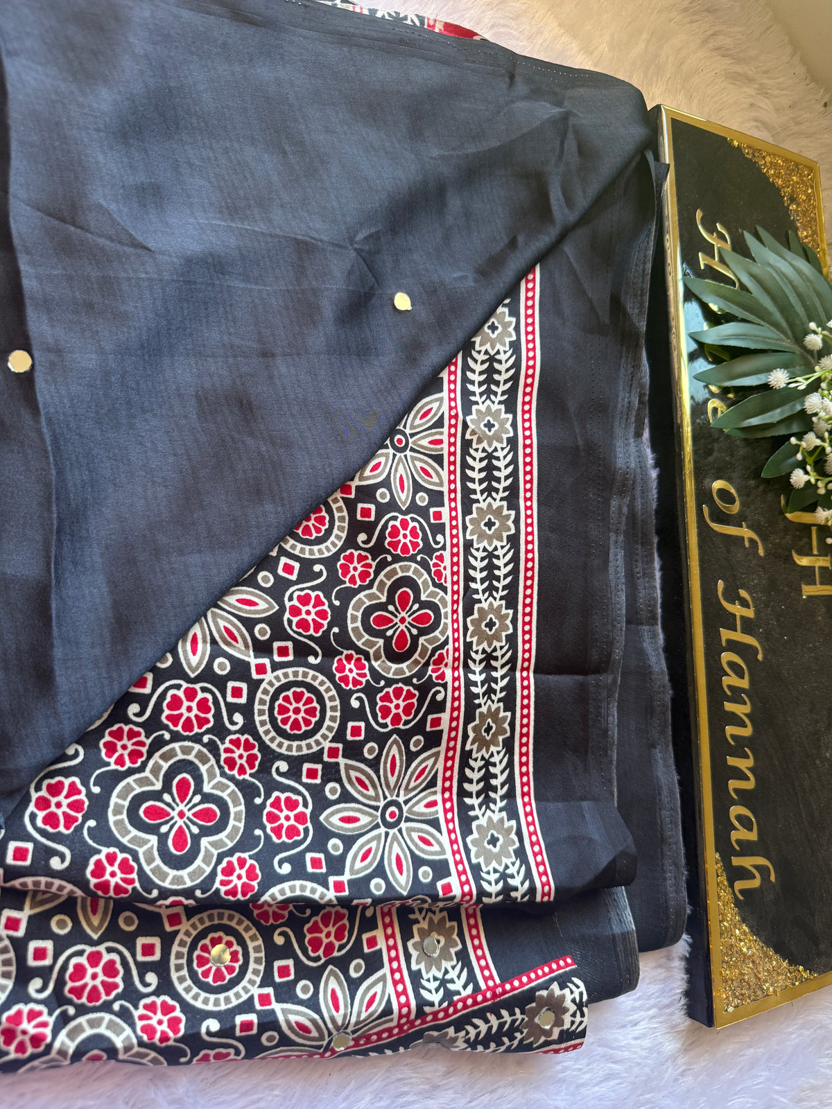 Charcoal Ajrakh saree with red and ivory block-printed border and mirror work
