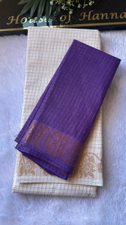 Purple Sungudi cotton saree folded to show the gold floral pallu